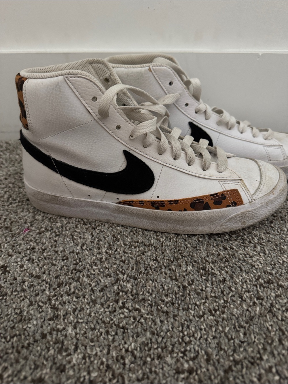 Nike Youth White High-Top Sneakers with Black Swoosh and Brown Leopard Accent